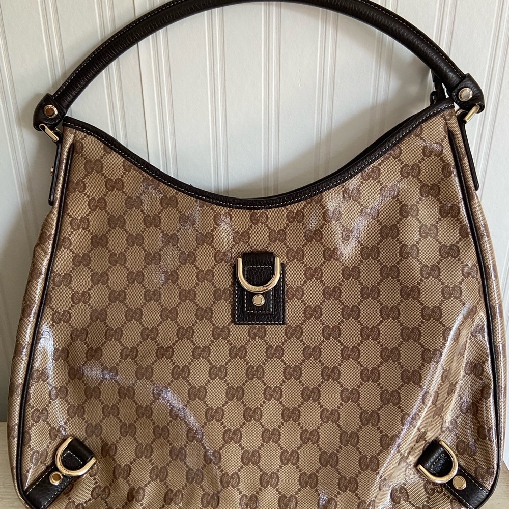 Beautiful Gucci patent leather traditional pattern.